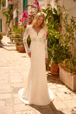 Fit-and-flare all-over lace wedding dress with deep V-neckline, sheer long sleeves, and button keyhole back.