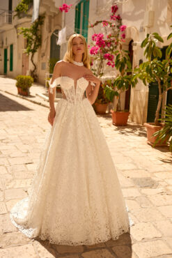 A-line full lace wedding dress with sheer corset bodice, detachable off-shoulder sleeves, and chapel train.