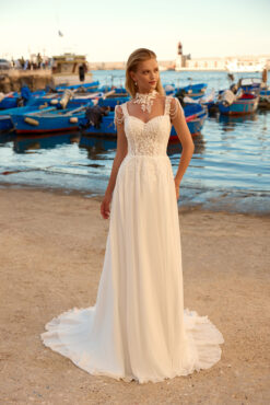 A-line chiffon wedding dress with lace appliqué bodice, pearl shoulder drapes, open back, and chapel train.